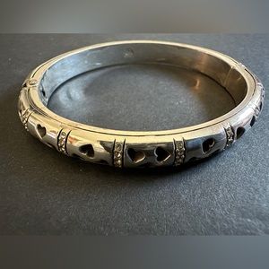 Brighton hinged bangle bracelet with hearts and rhinestones.